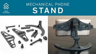 Print Your Mind: A Mechanical Phone Stand by Damian – 3D printed by Sintratec