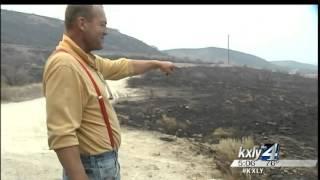 Man's cement home survives wall of flames