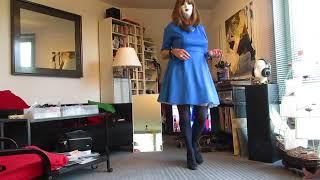 crossdresser in blue dress with petty