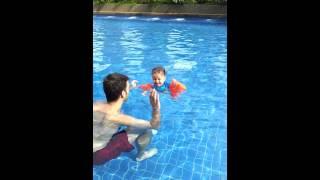 Shia swimming with armbands