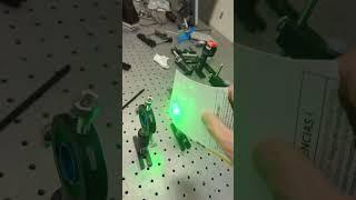 Making a green light source with an engraving fiber laser #science #physics #laser