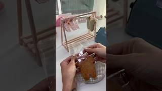 Cute way to display ur cookies! 3d printed the rack and hangers  #cookies #cookiedecorating #craft