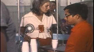 Vietnamese refugees having their food at a camp during Operation New Life in Penn...HD Stock Footage