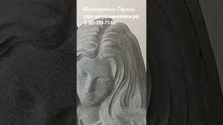 Гранитный памятник ангел с сердцем.