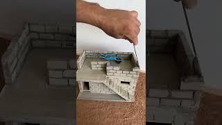 This Man Built a Tiny Model House