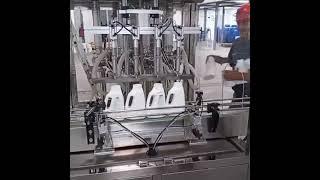 Liquid detergent bottles filling machine 4 nozzles filler #cleanerfillingmachine #machine#automobile