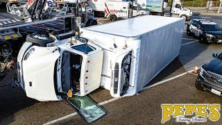 Box Truck Rolls Over Through Busy Intersection!