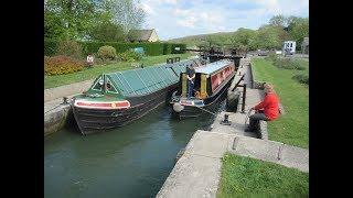 English canal narrowboat going through a lock in Oxford.