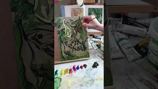 Artist painting a colorful study of a moth after Van Gogh on canvas w/ acrylic paints in art studio