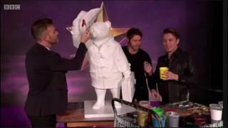 Take That paint a Paddington Bear statue on the Grahan Norton show for Charity.