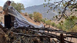 Iran nomadic life: Jahangir and Maryam's efforts to shelter the sheep from the autumn rain ️