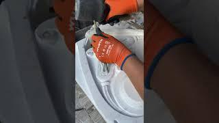 Carving a flower in marble.