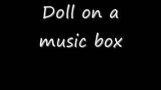 Doll on a music box