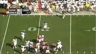 Oregon Qb Kellen Clemens pushes the pile forward for a first down vs. OU 9-18-04