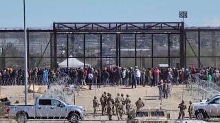 Migrants rush the Texas border in El Paso