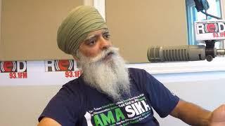 Ravi Singh from Khalsa Aid talks with Harjinder Thind