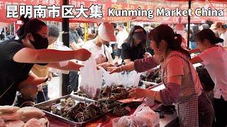 In Kunming, China, residents are busy preparing for the holiday by shopping at the morning market.