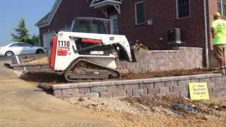 Side Yard Retaining Wall Hardscape Design on a Sloped Hill: RYAN'S LANDSCAPING