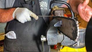 Chainsaw sharpening with a file by hand.