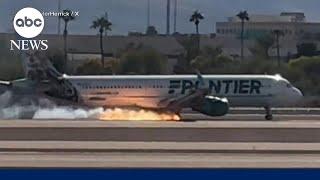 Flames erupt from Frontier Airlines plane after hard landing in Las Vegas