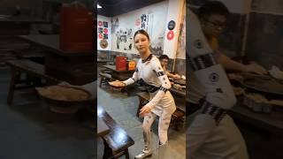 A Robotic Waiter Serves Food at a Chongqing Hotpot Restaurant in China! #chinarobots