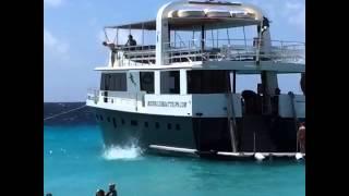 Eight year old jumping from the Mermaide @ klein Curaçao