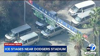 ICE agents seen staging near Dodger Stadium amid reports of more immigration raids across LA County