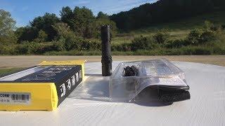 The Nitecore NM01 176 meter throw out of a pocket Flashlight