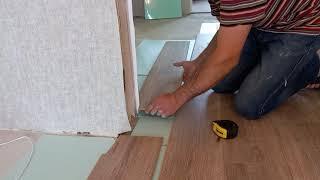 Laying laminate flooring without a threshold. The transition of the laminate from the room