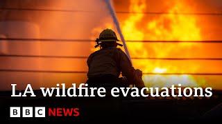 LA fires burn out-of-control as thousands evacuated from homes | BBC News