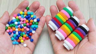 WOW, WHAT A COOL IDEA, LOOK WHAT I DID WITH COLORFUL BEADS AND RUBBER BANDS.