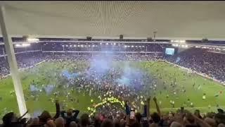 Everton fans at Goodison Park Incredible celebrating on playground their stay in the Premier League