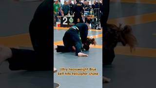 Ultra heavyweight blue belt hits helicopter choke (variation) in tournament #bjj #shorts #submission