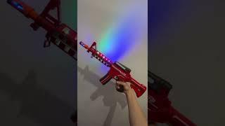 - Hersen - Toy M4A1 Carbine Gun  with 3D LED Revolving Lights and Real Sound for Kid