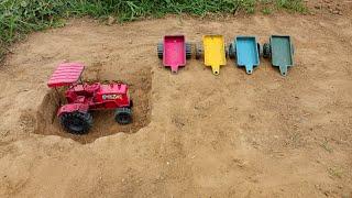 Mahindra tractor went to take the mini but there another tractor pulled it out of the ditch