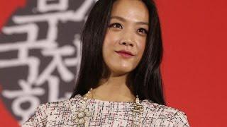 Scuffle Erupts As Tang Wei Leaves Exhibition