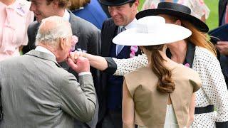 King Charles pictured kissing Duchess of York’s hand