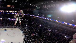 POV: Military member rappels from area rafters to deliver game puck