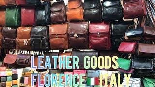 THE SAN LORENZO LEATHER MARKET HERE IN FLORENCE ITALYA THOUSAND THOUSAND OF ITEMS .