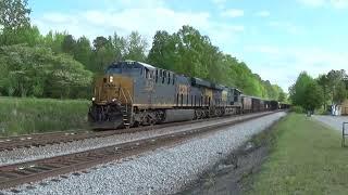 CSX B 428 23 rock loads by Langford 4-25-24 Engines 3121 & 711 (ES44AH) lead