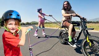 SPiN to CHOOSE our DAY!! Adley & Niko ski behind my Bike! then Family Games & PiRATE CRABS CARTOON