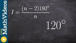 Find the number of sides of a regular polygon, given the measure of one interior ang