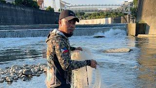 River full of fish castnet