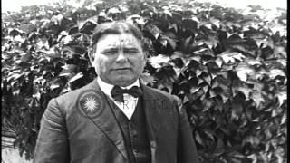 United States Senator from Idaho William Edgar Borah poses in front of a plant in...HD Stock Footage