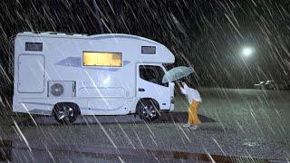 Small family enjoying a heavy rainy and windy night | Ride a DeLorean!