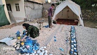 Banoo’s Artistic Touch: Painting River Stones to Decorate Her Village Home