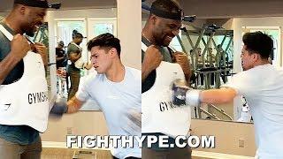 RYAN GARCIA DRILLS UFC'S FRANCIS NGANNOU AS HARD AS HE CAN & GETS LAUGH BACK IN BODY SHOT CHALLENGE