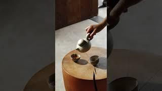 Pouring Tea on a Teacup