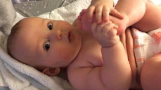 Baby sucking toe