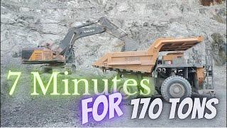 Volvo EC950E Excavator Loading Chinese XCMG XDE150 Dump Truck